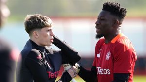 Man Utd’s transfer drama heats up as star player flaunts rivals’ shirt sparking wild speculation.